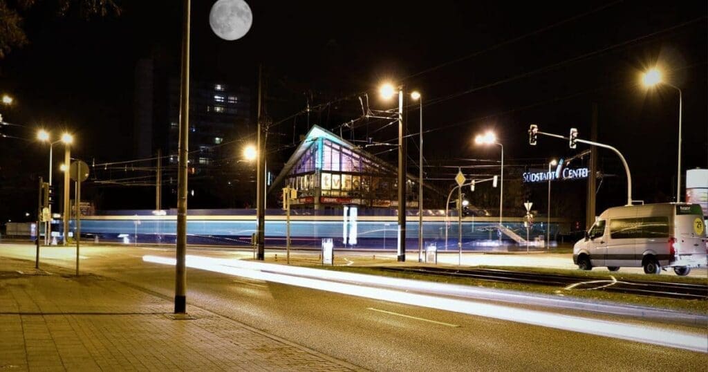 Streetlight installation along a busy road.